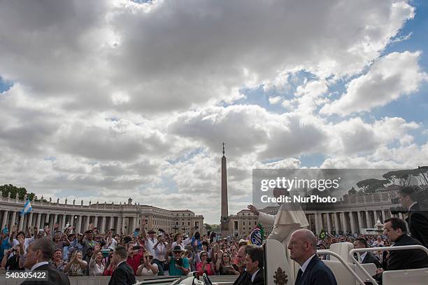 Pope Francis arrives for his weekly general audience in St. Peter's Square at the Vatican under a cloudy sky, Wednesday, June 15, 2016.