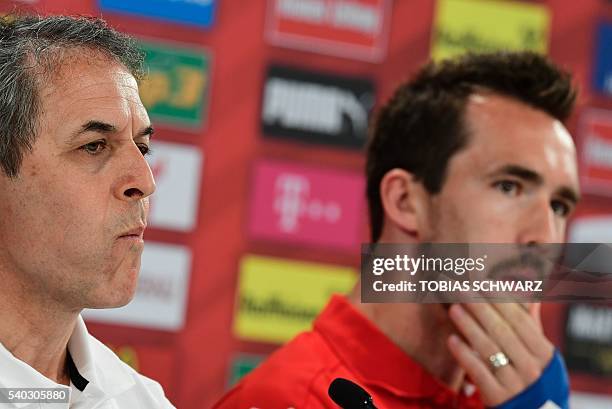 Austria's coach Marcel Koller and defender and team captain Christian Fuchs hold a press conference at their training ground in Mallemort, on June 15...