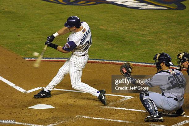 Luis Gonzalez of the Arizona Diamondbacks swings at a pitch during game 6 of the World Series against the New York Yankees at Bank One Ballpark in...