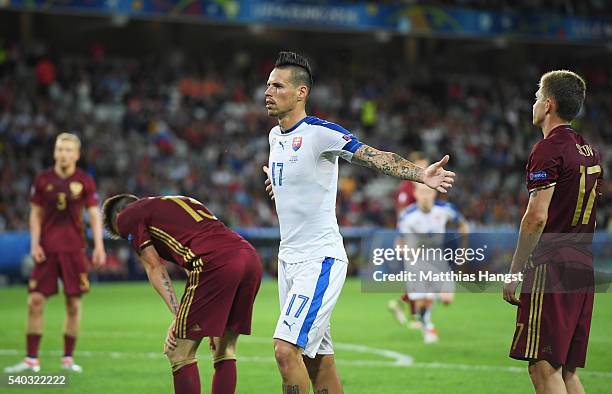 Marek Hamsik of Slovakia celebrates scoring his sides second goal during the UEFA EURO 2016 Group B match between Russia and Slovakia at Stade...