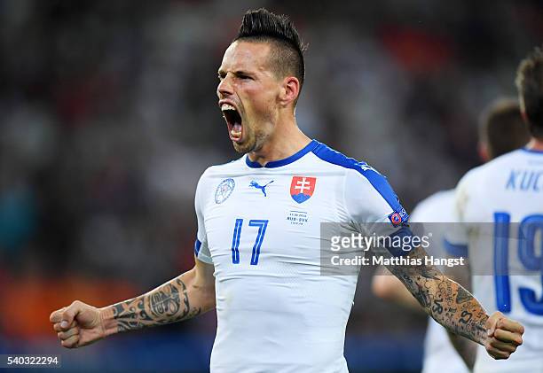 Marek Hamsik of Slovakia celebrates scoring his sides second goal during the UEFA EURO 2016 Group B match between Russia and Slovakia at Stade...