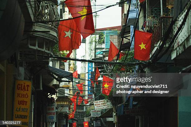 vietnam with flag - vietnamese flag stock pictures, royalty-free photos & images