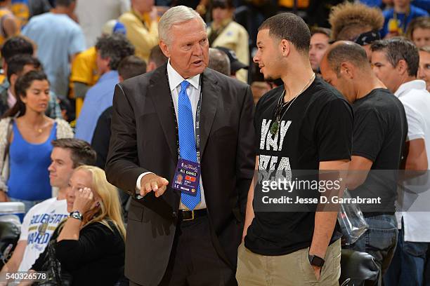 Jerry West of the Golden State Warriors talks to Seth Curry of the Sacramento Kings before Game Five of the 2016 NBA Finals between the Cleveland...