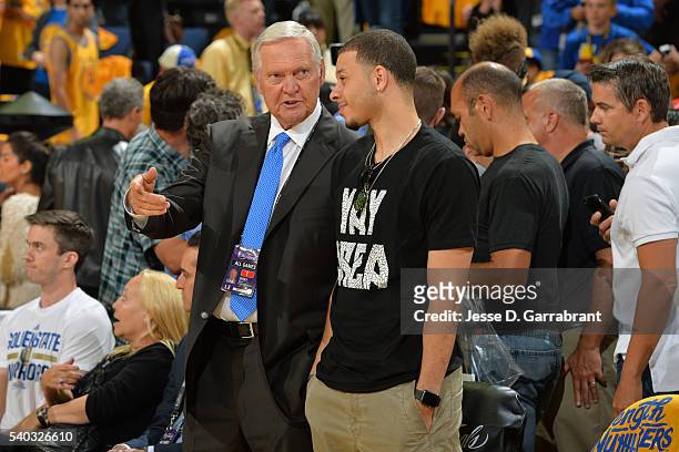 Jerry West of the Golden State Warriors talks to Seth Curry of the Sacramento Kings before Game Five of the 2016 NBA Finals between the Cleveland...