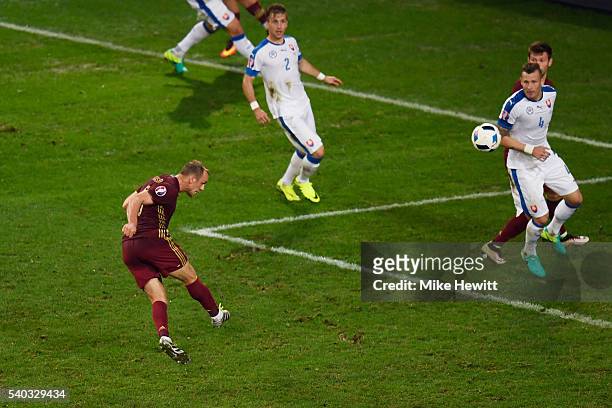 Denis Glushakov of Russia scores his sides first goal during the UEFA EURO 2016 Group B match between Russia and Slovakia at Stade Pierre-Mauroy on...