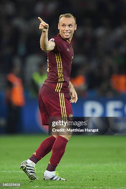 Denis Glushakov of Russia celebrates after he scores his sides first goal during the UEFA EURO 2016 Group B match between Russia and Slovakia at...