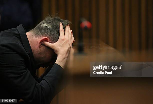Oscar Pistorius reacts during the third day of Oscar's hearing for a resentence at Pretoria High Court on June 15, 2016 in Pretoria, South Africa....