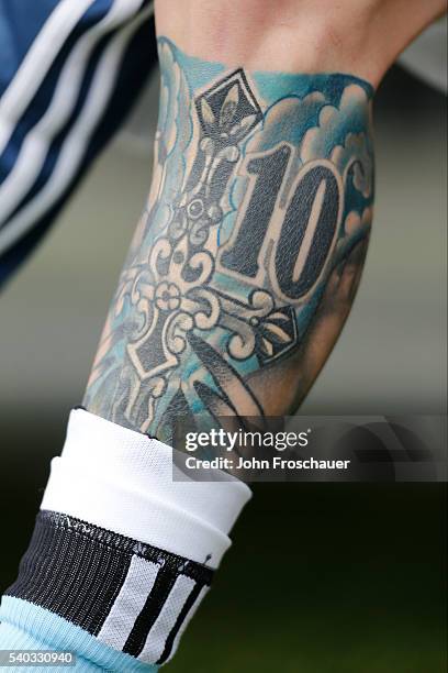 Detail of the tattoo of Lionel Messi of Argentina during a group D match between Argentina and Bolivia at CenturyLink Field as part of Copa America...