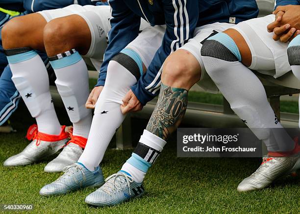 Detail of the tattoo and boots of Lionel Messi of Argentina during a group D match between Argentina and Bolivia at CenturyLink Field as part of Copa...