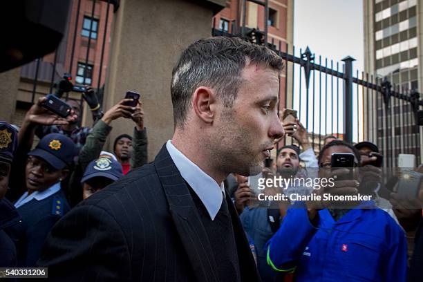 Oscar Pistorius leaves the North Gauteng High Court at the end of the third day of his resentencing hearing at Pretoria High Court on June 15, 2016...