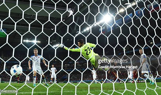 Denis Glushakov of Russia scores his sides first goal during the UEFA EURO 2016 Group B match between Russia and Slovakia at Stade Pierre-Mauroy on...