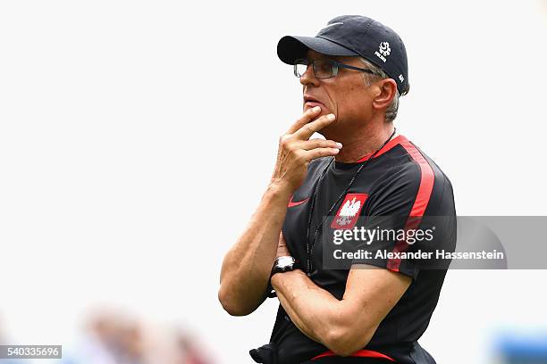 Adam Nawalka, head coach of Poland looks on during a team Poland training session ahead of the UEFA EURO 2016 Group C match between Germany and...