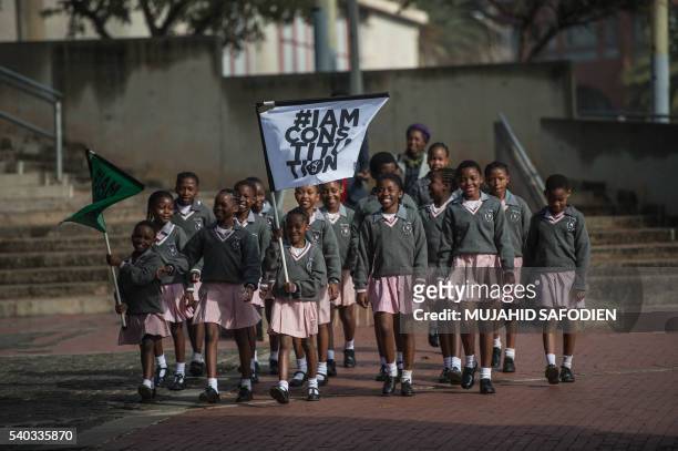 South African students from Chief Albert Luthuli Primary and High School in Daveyton attend the event "I am constitution" at Constitution Hill on...