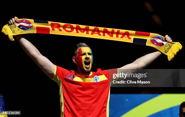 A Romanian supporters fashions his teams colours during the UEFA EURO 2016 Group A match between Romania and Switzerland at Parc des Princes on June...