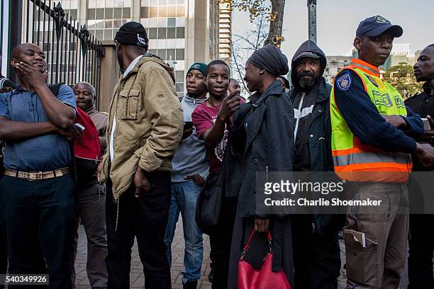 Crowds wait outside the North Gauteng High Court for a glimpse of Oscar Pistorius leaving on June 15, 2016 in Pretoria, South Africa. Oscar Pistorius...