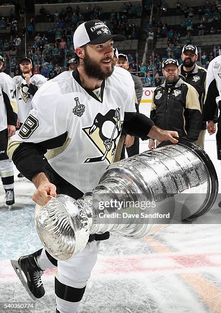 Kris Letang of the Pittsburgh Penguins celebrates with the Stanley Cup after the Penguins won Game 6 of the 2016 NHL Stanley Cup Final over the San...