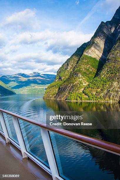 cruising geiranger fjord, norway - schiffsdeck stock-fotos und bilder