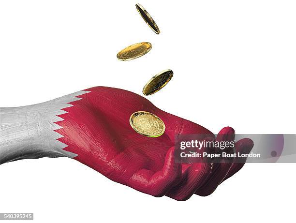 hand painted flag of qatar with gold coins - qatar flag stock pictures, royalty-free photos & images