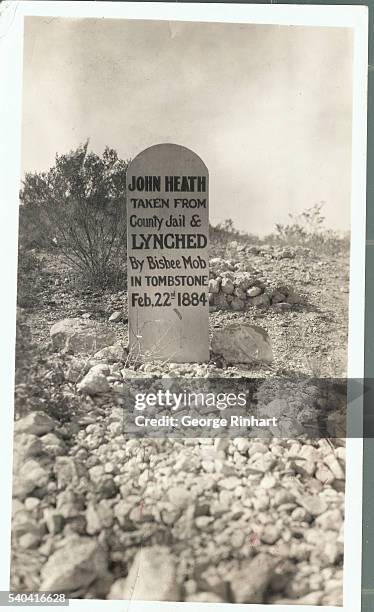 Picture shows a headstone in Tombstone, Arizona.