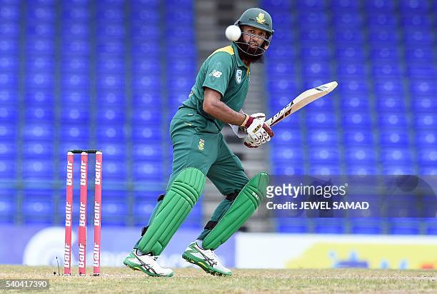 South African cricketer Hashim Amla plays a shot during the 6th One Day International match between West Indies and South Africa in the Tri-nation...