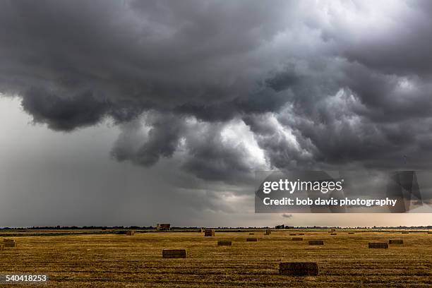 storm after harvest - fen stock pictures, royalty-free photos & images