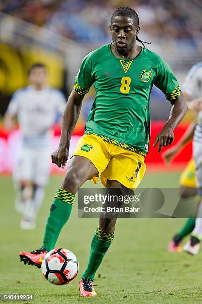 Clayton Donaldson of Jamaica dribbles the ball against Uruguay in the second half of a group C match at Levi's Stadium as part of Copa America...