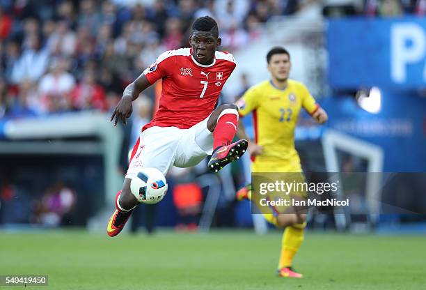Breel Embolo of Switzerland controls the ball during the UEFA EURO 2016 Group A match between Romania and Switzerland at Parc des Princes on June 15,...