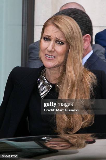 Singer Celine Dion leaves the 'Art District' apartments on June 15, 2016 in Paris, France.