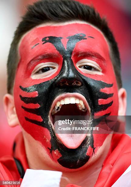 An Albania fan wait for the start of the Euro 2016 group A football match between France and Albania at the Velodrome stadium in Marseille on June...