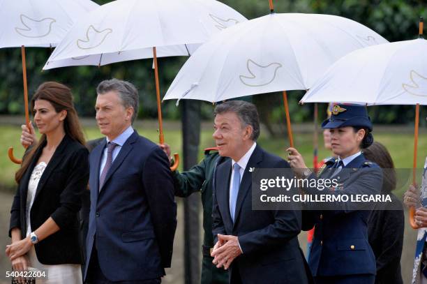 Colombian President Juan Manuel Santos , Argentina's President Mauricio Macri and Argentinian First Lady Juliana Awada attend Macri's welcoming...