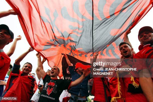 Albania supporters cheer as they wait near the stade Velodrome of Marseille, prior to the start of the Euro 2016 football match between France and...