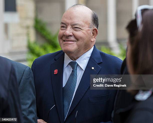 Former Detroit Red Wing coach Scotty Bowman walks into the church during the Gordie Howe funeral at the Cathedral of the Most Blessed Sacrament on...