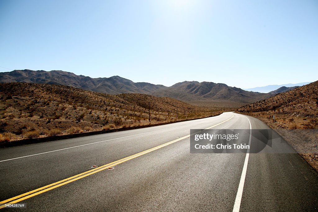 Endless street in the desert mountain