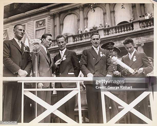 New York: A Famous Park Sees Another Reception For Heroic Fliers: Mayor Walker Awards City Medals To Kingsford Smith And Aides. Photo shows left to...