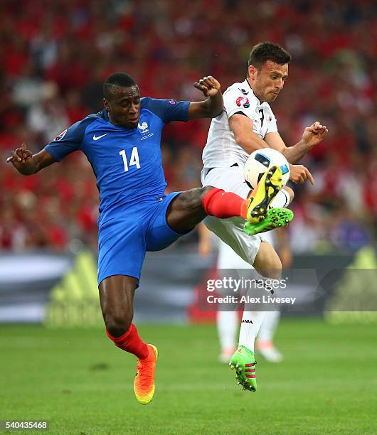 Blaise Matuidi of France and Ledian Memushaj of Albania in action during the UEFA EURO 2016 Group A match between France and Albania at Stade...