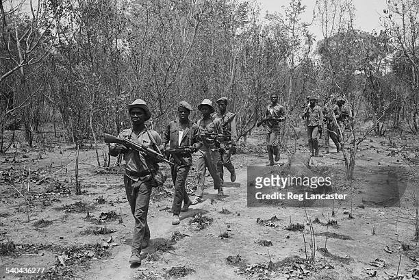 Rebel army on patrol armed with some of the issued range of Russian weapons during the Portuguese Colonial War, Guinea-Bissau, West Africa, 1972.