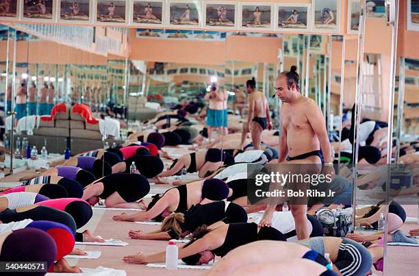 Indian Yoga guru Bikram Choudhury instructs his yoga class in heated room, Beverly Hills, California, February 2, 2000.