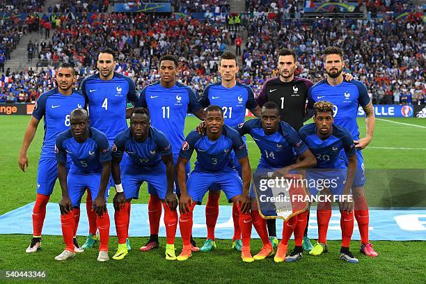 France's forward Dimitri Payet, defender Adil Rami, forward Anthony Martial, defender Laurent Koscielny, goalkeeper Hugo Lloris, forward Olivier...