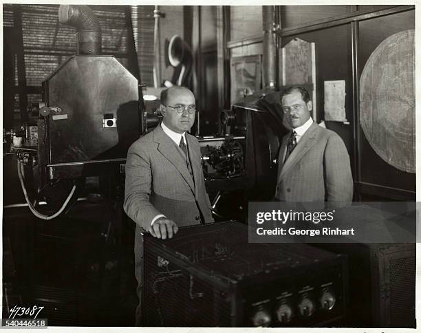 Photo shows Dr. August Karolus , German television expert and University of Leipzig professor, and Dr. E.F.W. Alexanderson in General Electric's...