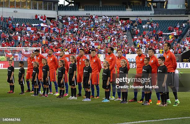 Players of Chile look on during pre game ceremonies before a group D match between Chile and Panama at Lincoln Financial Field as part of Copa...