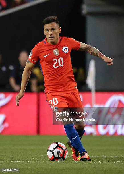 Charles Aranguiz of Chile drives the ball during a group D match between Chile and Panama at Lincoln Financial Field as part of Copa America...