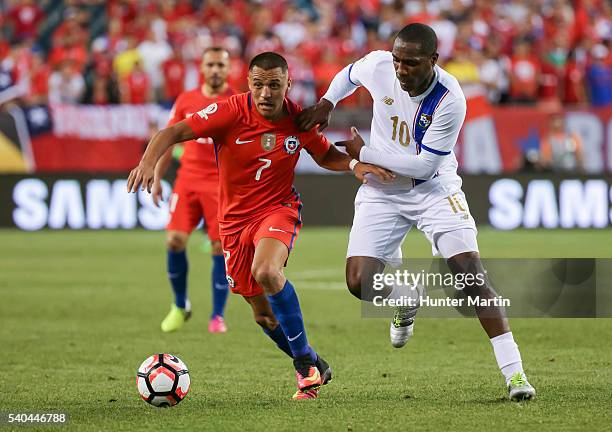 Alexis Sanchez of Chile and Luis Tejada of Panama fight for the ball during a group D match between Chile and Panama at Lincoln Financial Field as...