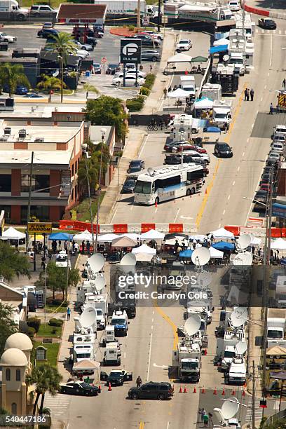 Media trucks line the street on Orange Ave. One block form where FBI investigators continue to work at the Pulse nightclub on Wednesday, June 15,...