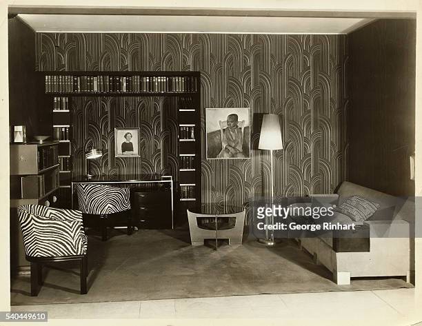 Interior shows living room furniture and wallpaper in Art Deco style. Undated.