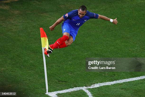 Dimitri Payet of France celebrates after he scored his sides second goal during the UEFA EURO 2016 Group A match between France and Albania at Stade...