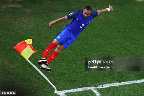 Dimitri Payet of France celebrates after he scored his sides second goal during the UEFA EURO 2016 Group A match between France and Albania at Stade...