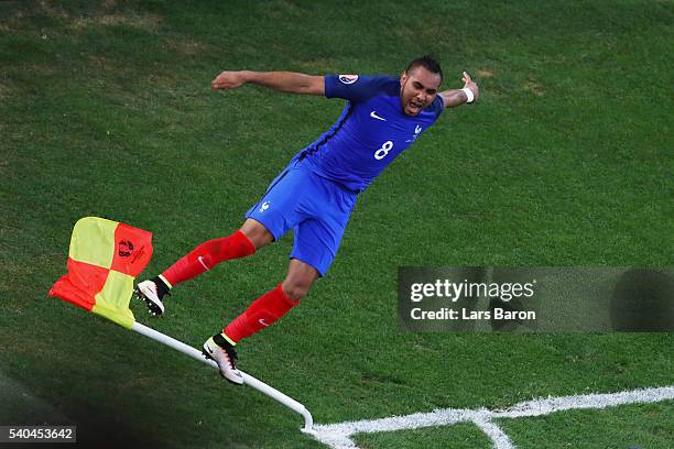 Dimitri Payet of France celebrates after he scored his sides second goal during the UEFA EURO 2016 Group A match between France and Albania at Stade...