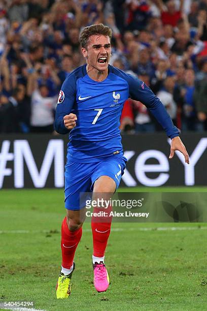 Antoine Griezmann of France celebrates scoring his sides first goal during the UEFA EURO 2016 Group A match between France and Albania at Stade...