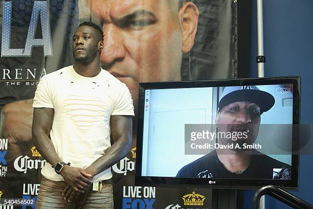 World Heavyweight Champion and Chris Arreola, via Skype, pose during a press conference on June 15, 2016 in Birmingham, Alabama. The conference is to...