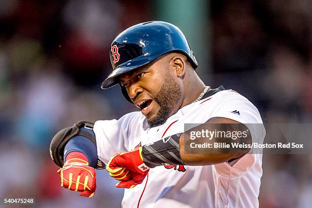 David Ortiz of the Boston Red Sox reacts after hitting an RBI single during the third inning of a game against the Baltimore Orioles on June 15, 2016...